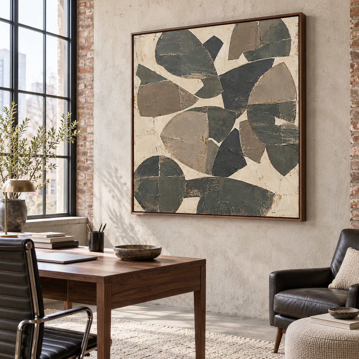 Aperture-Relic in an airy home office with a reading chair and natural daylight.