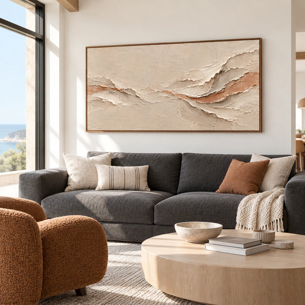 Apricot-Undercurrent above a low charcoal sofa in a bright living room.