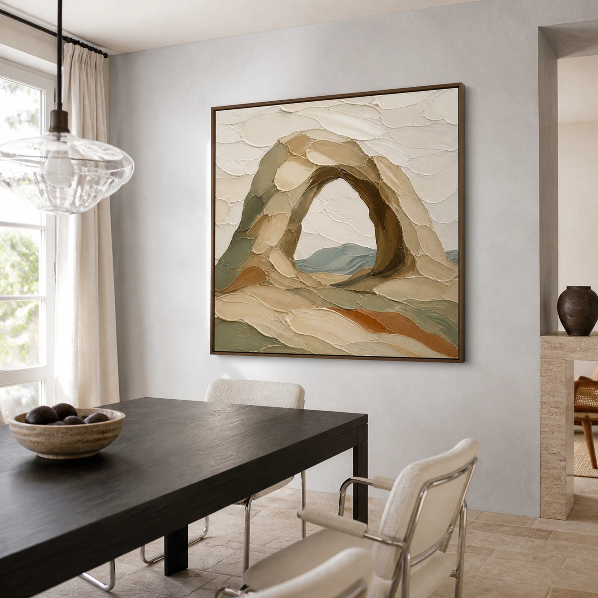 Arched-Quiet above a refined dining setting in natural daylight.