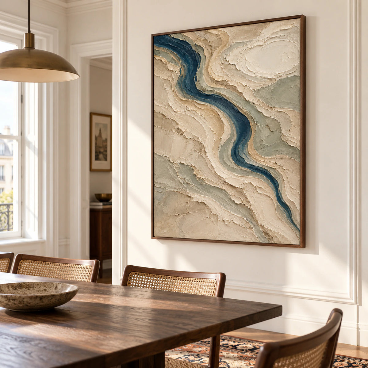 Large vertical abstract painting anchoring a refined dining room with a dark wood table, pale walls and daylight from tall windows.