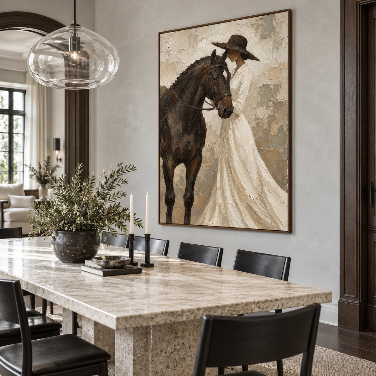 Textured horse and figure artwork above a refined dining setting with daylight.