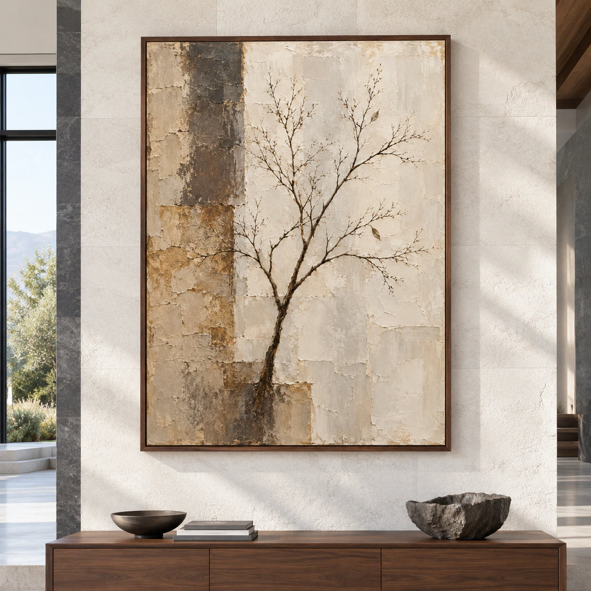 Large vertical tree painting viewed straight on in a spacious, sunlit room with restrained pale stone and walnut furnishings.