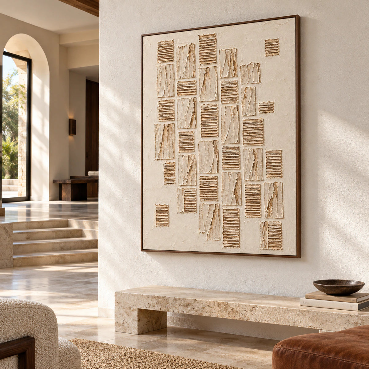 Monumental vertical relief artwork commanding a bright gallery-scale foyer with limestone floors and restrained furnishings.