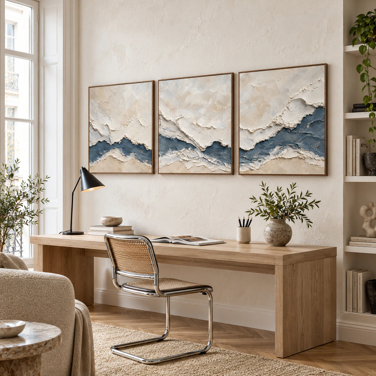 Cerulean-Sediment triptych in an airy home office reading space.