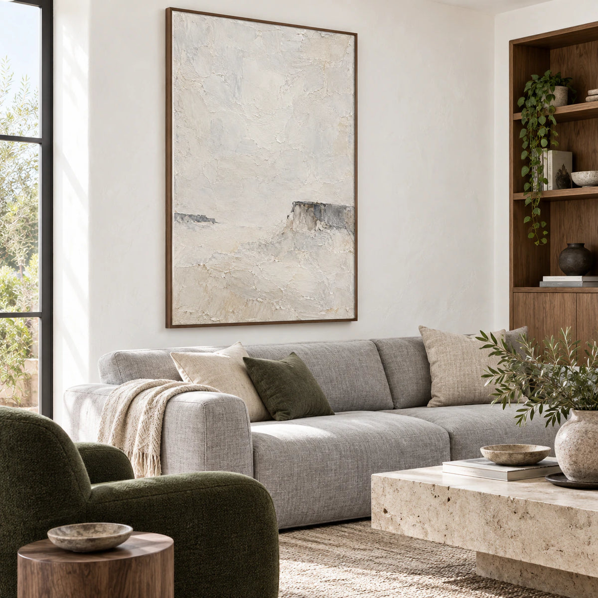 Chalk-Butte above a restrained sofa in a bright contemporary living room.