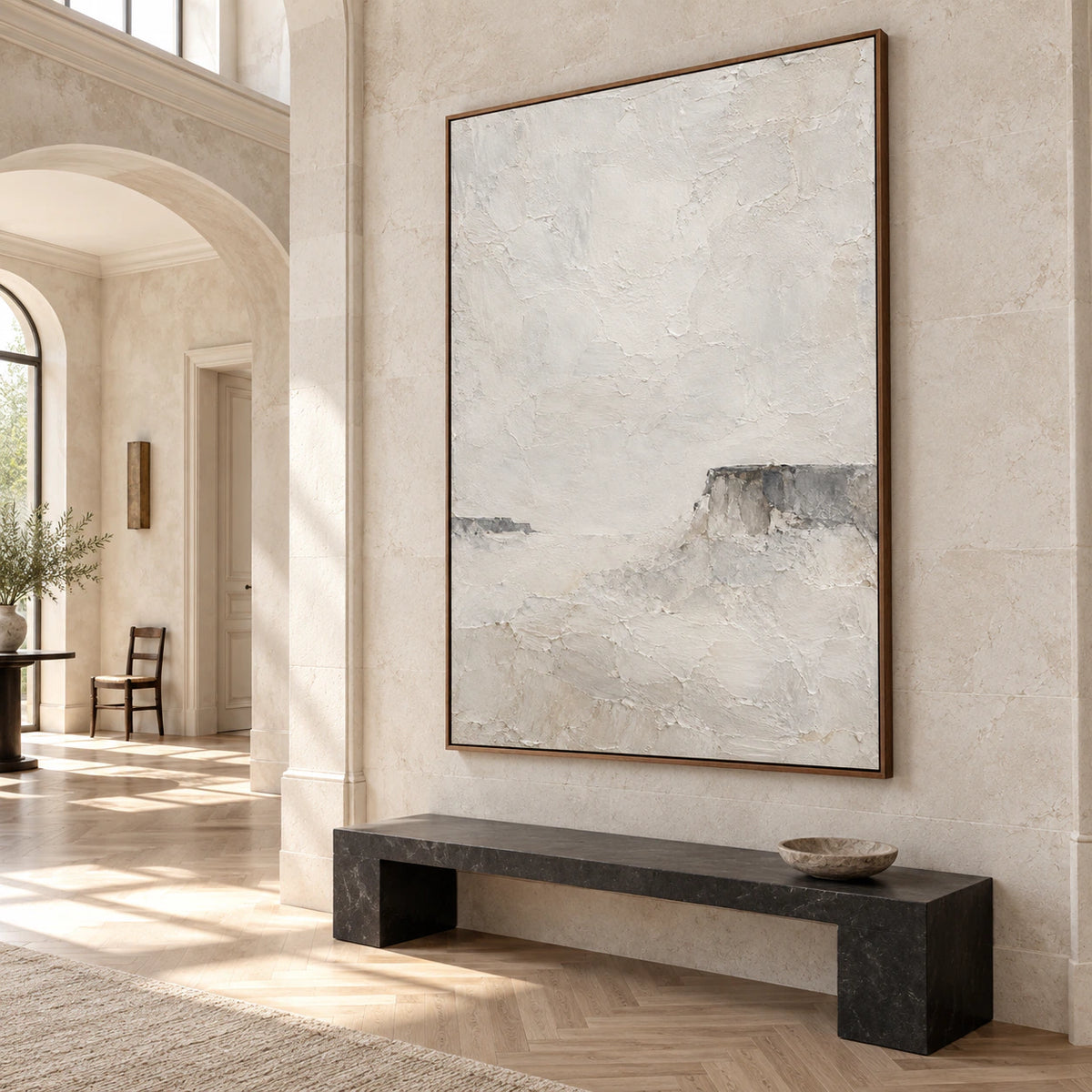Chalk-Butte at gallery scale in a luminous stone-lined foyer.