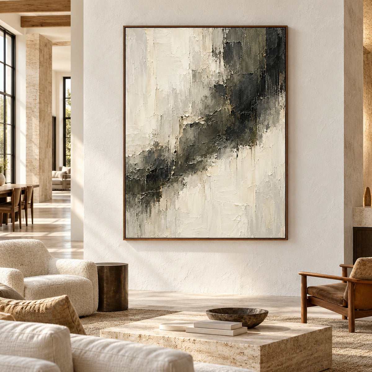 Large ivory and charcoal abstract painting in a daylight-filled hospitality loft with high ceilings, tall windows, warm wood, pale seating and a dark metal accent, viewed from the right.