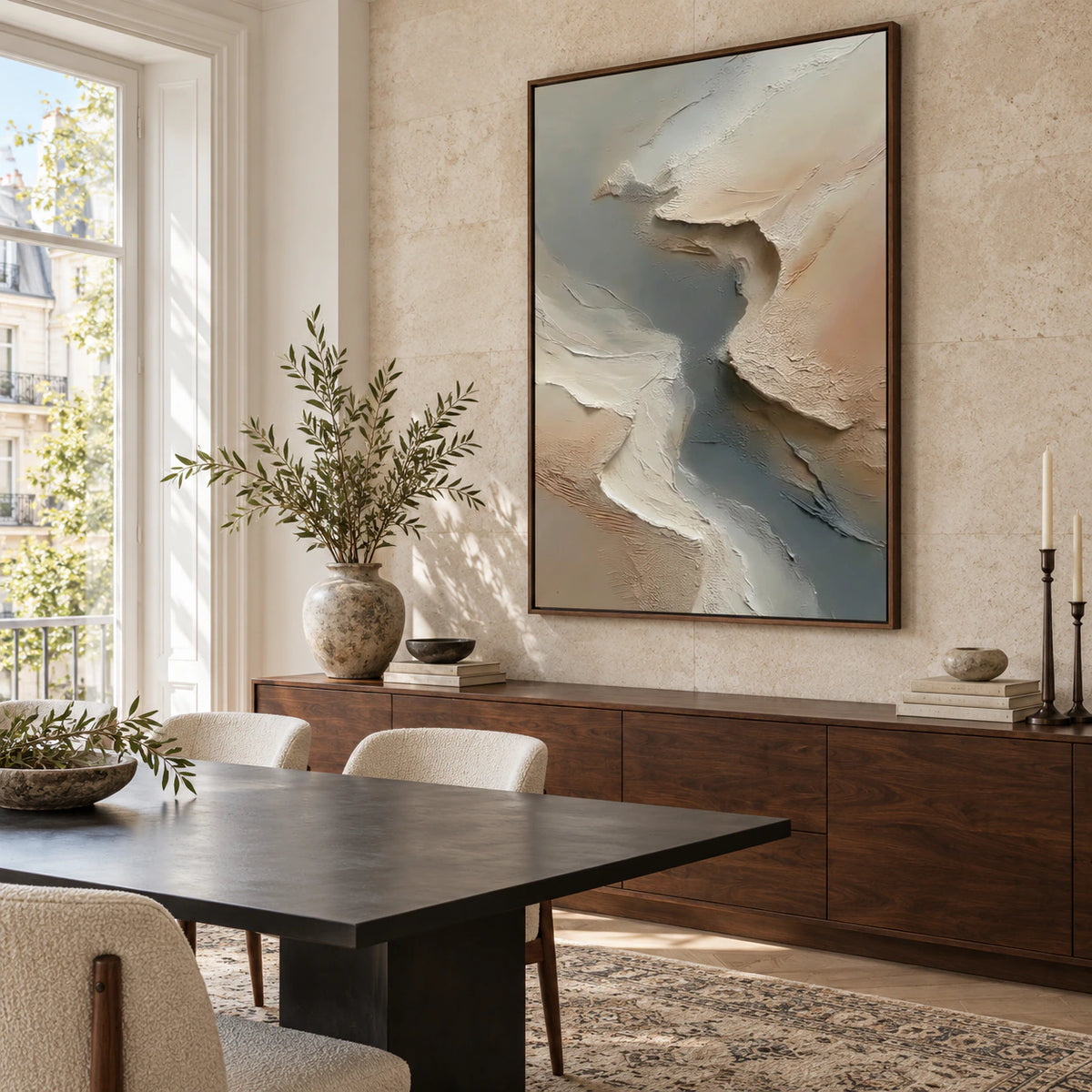 Refined dining room with the ivory, sand, and slate-gray relief painting as the central wall feature.