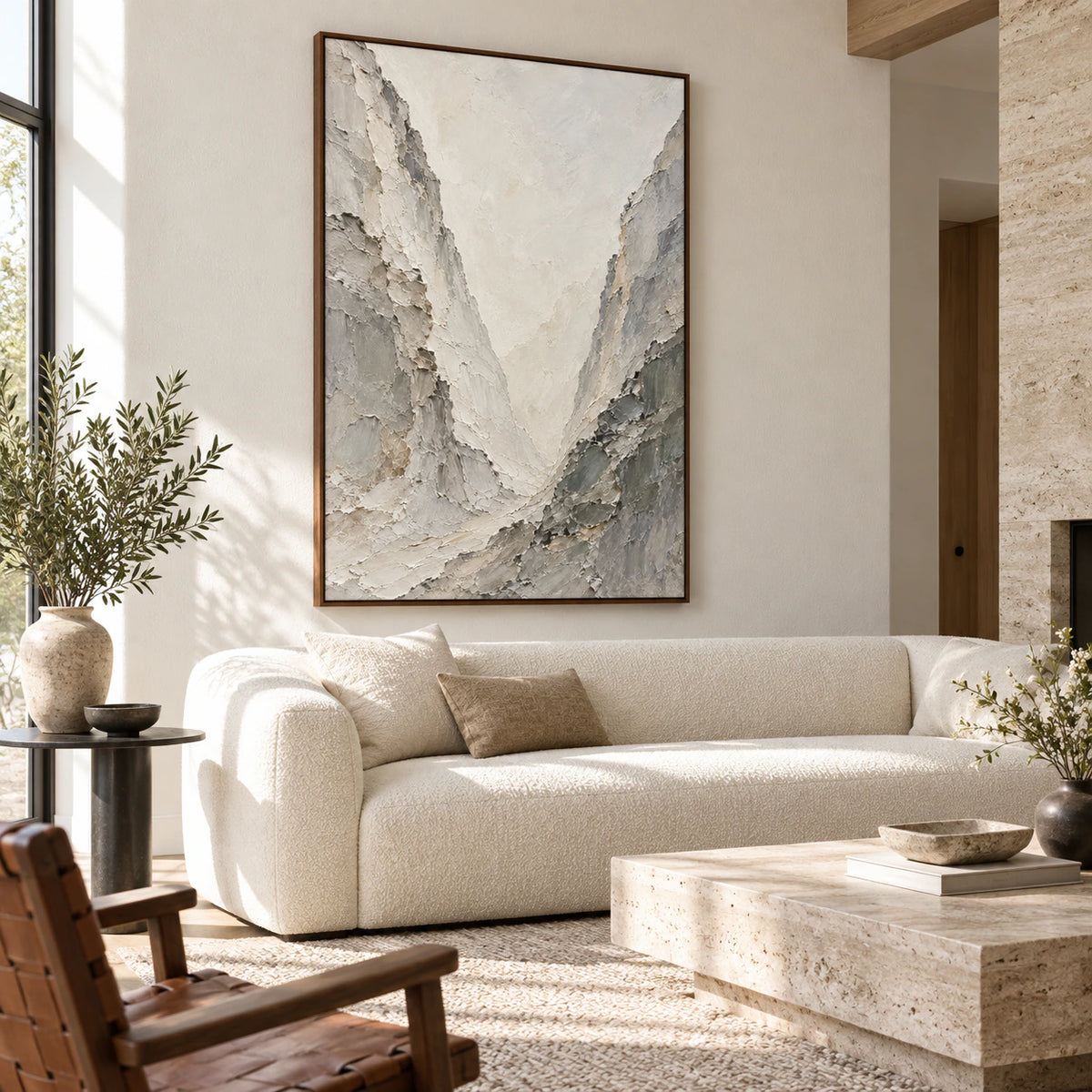 Chalk-Ravine above a neutral sofa in a bright contemporary living room.