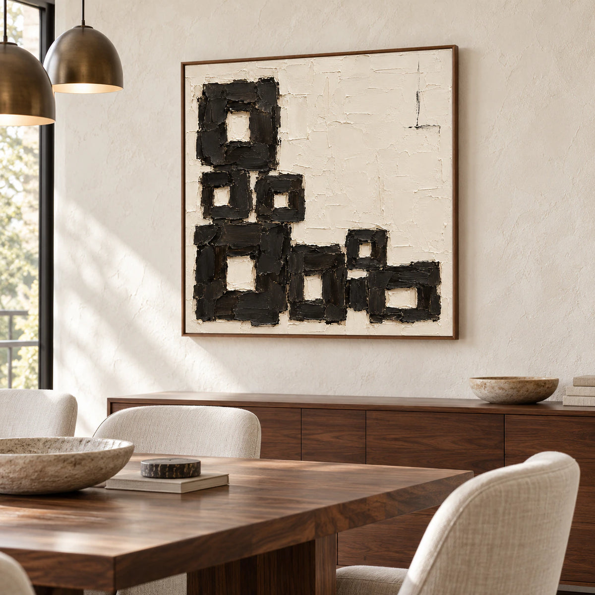 Square Charcoal-Staircase artwork anchoring a refined dining room with a long dark table and pale chairs.