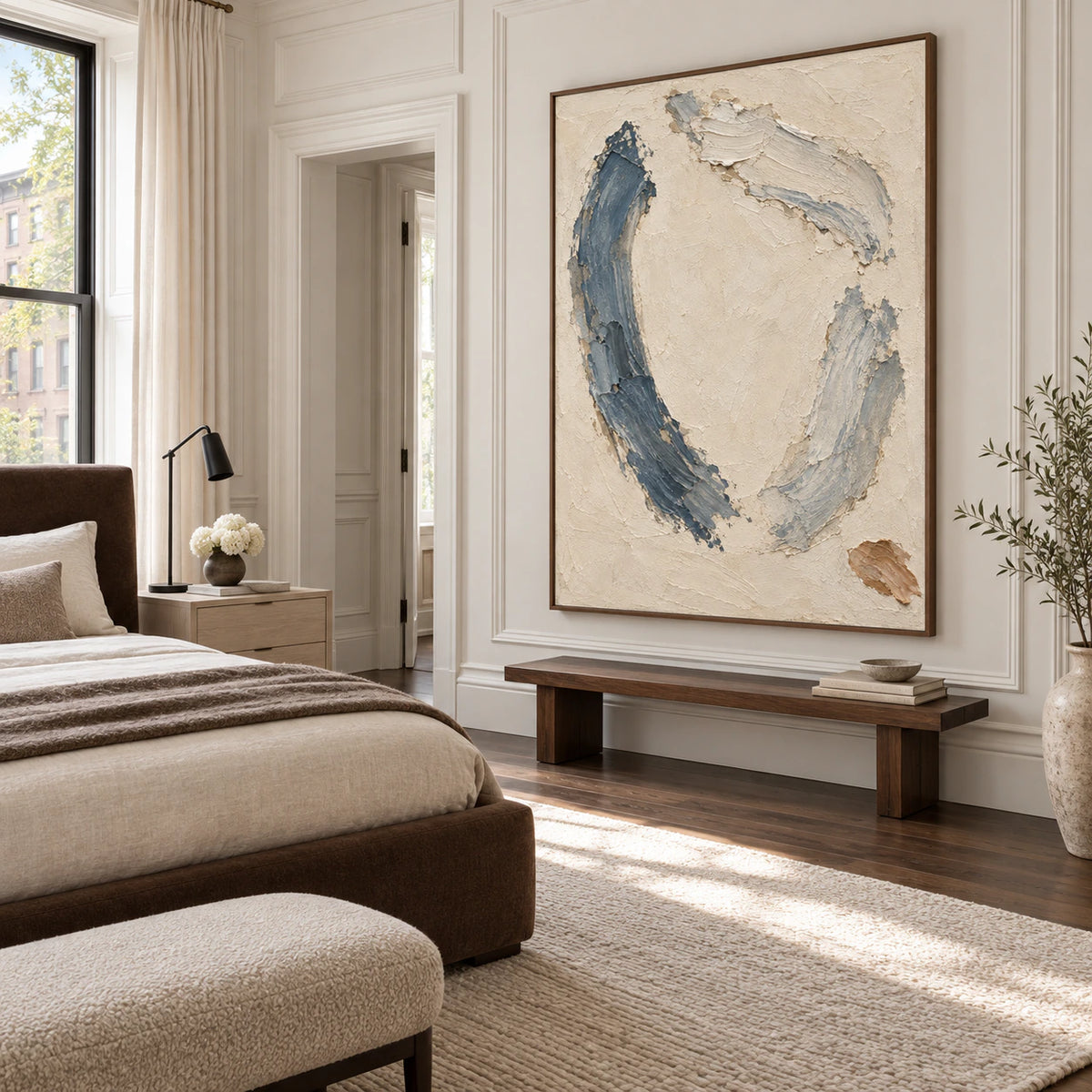 Cinder-Arc above a quiet bedroom seating area with soft natural light.