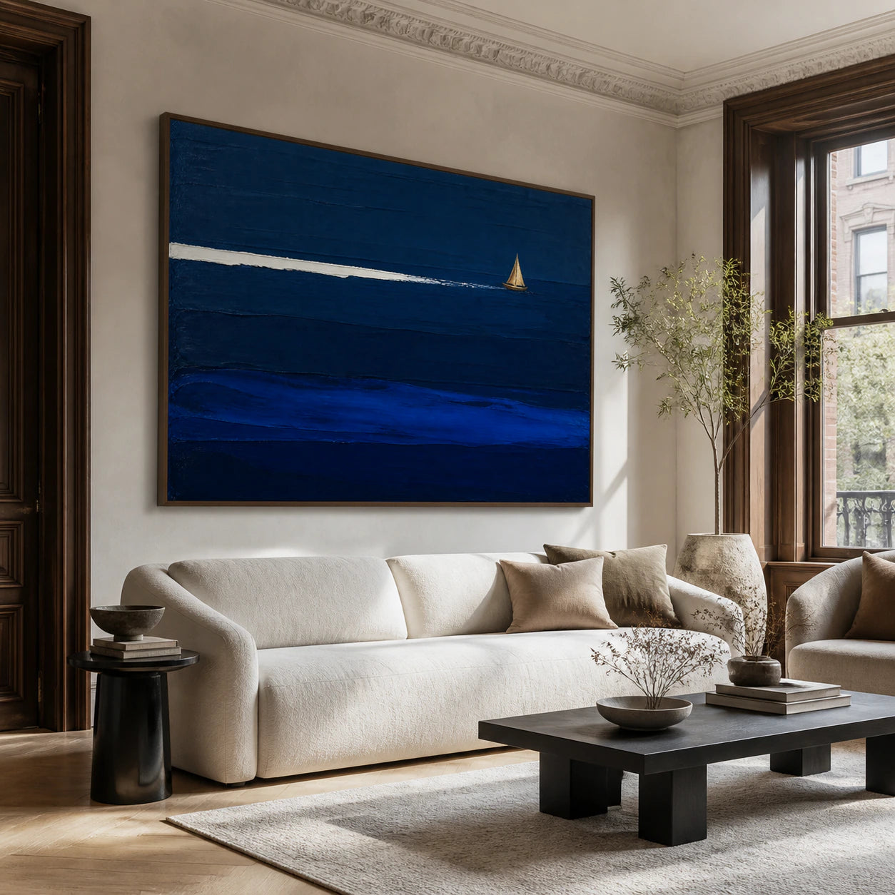 Cobalt-Drift above a restrained sofa in a bright contemporary living room.