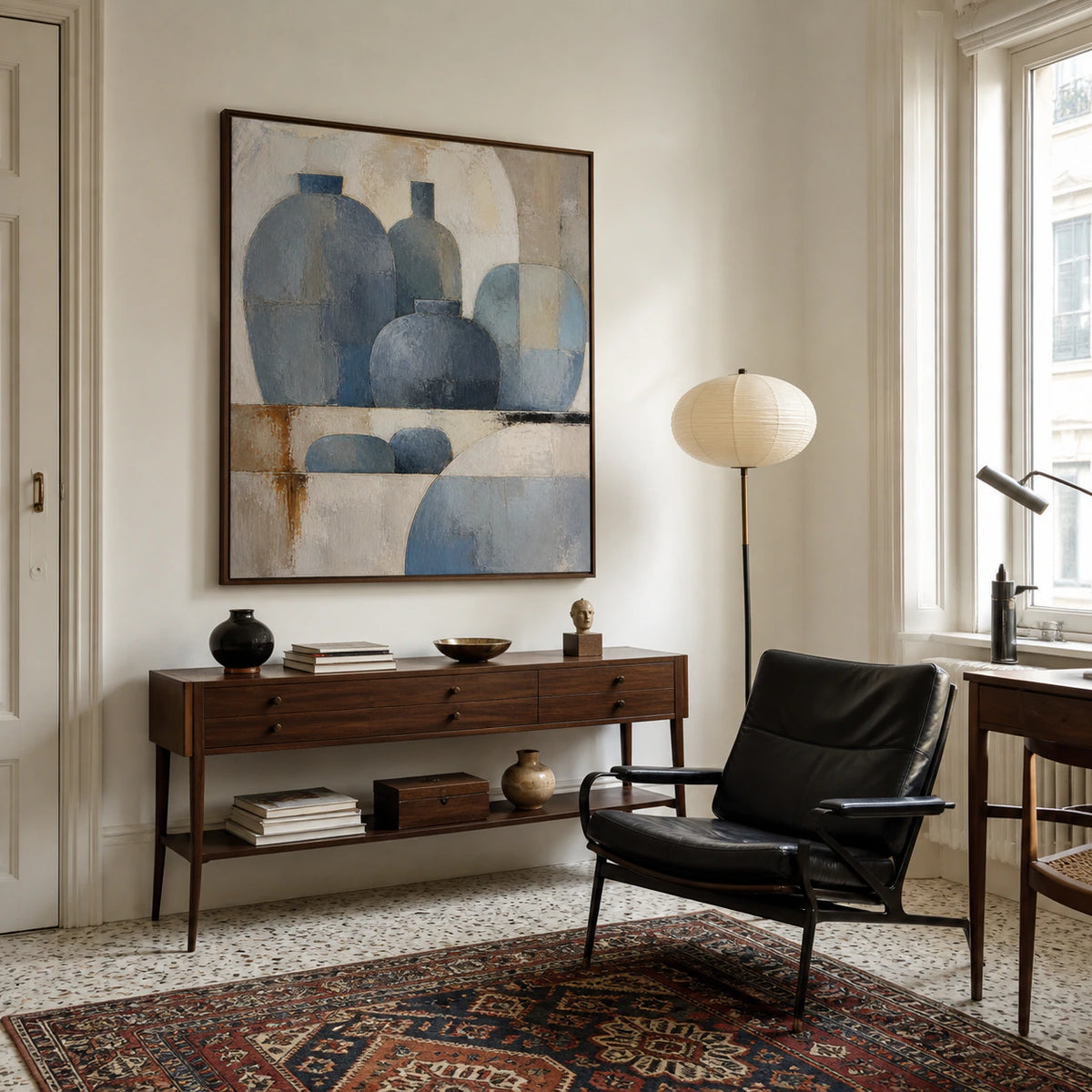 Square textured geometric painting in an airy home office reading space.