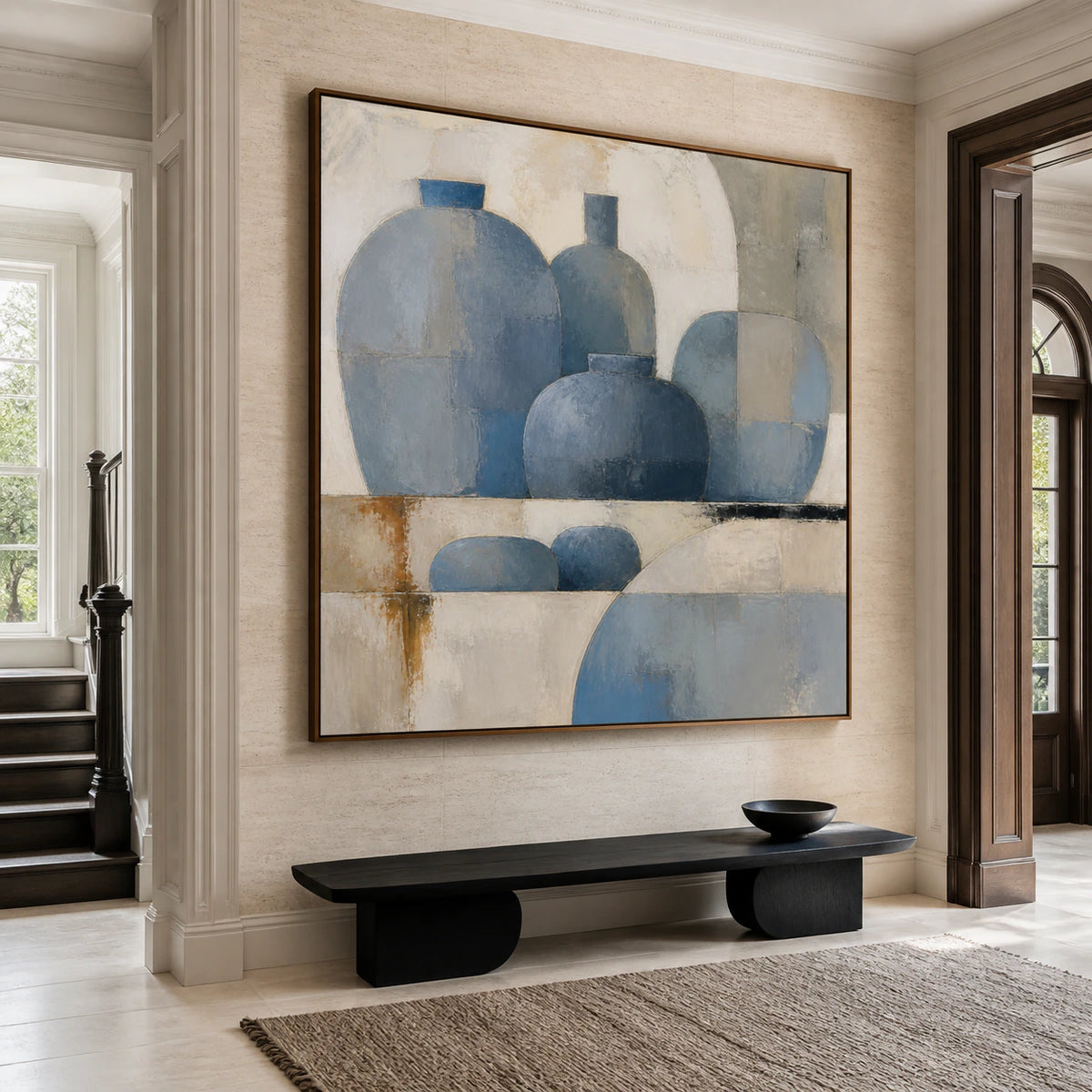 Large square blue-grey abstract painting in a gallery-scale foyer.