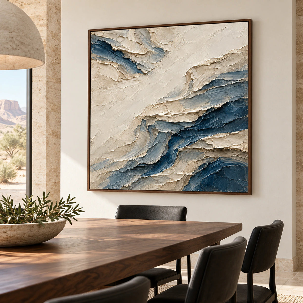 Cobalt-Weft hangs prominently in a refined dining room with a long dark wood table.