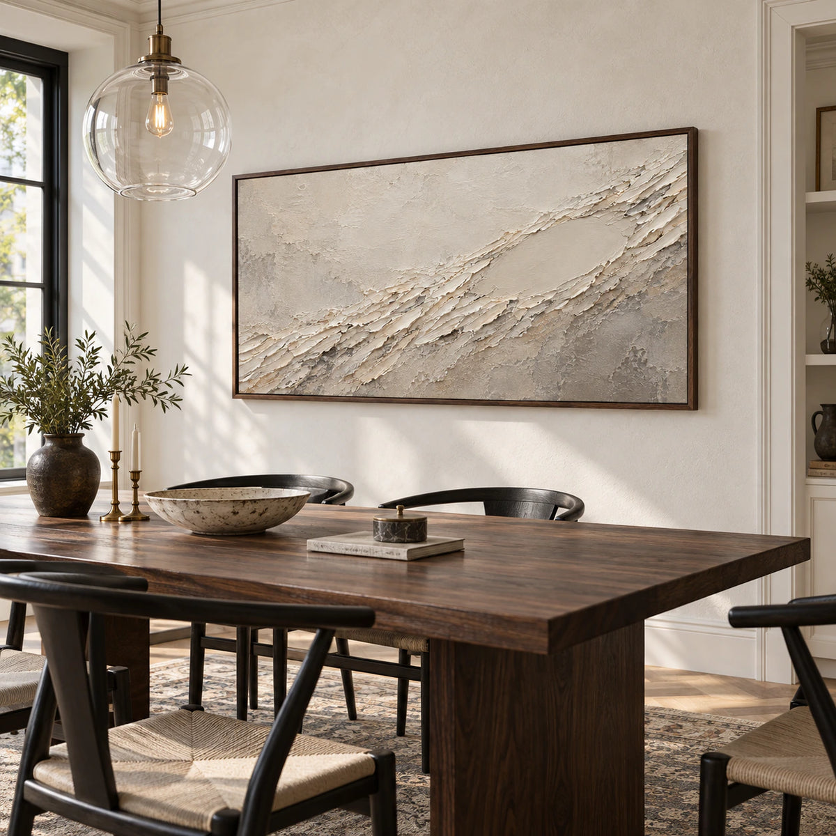 Textured ivory and gray abstract artwork in a refined daylight dining room.