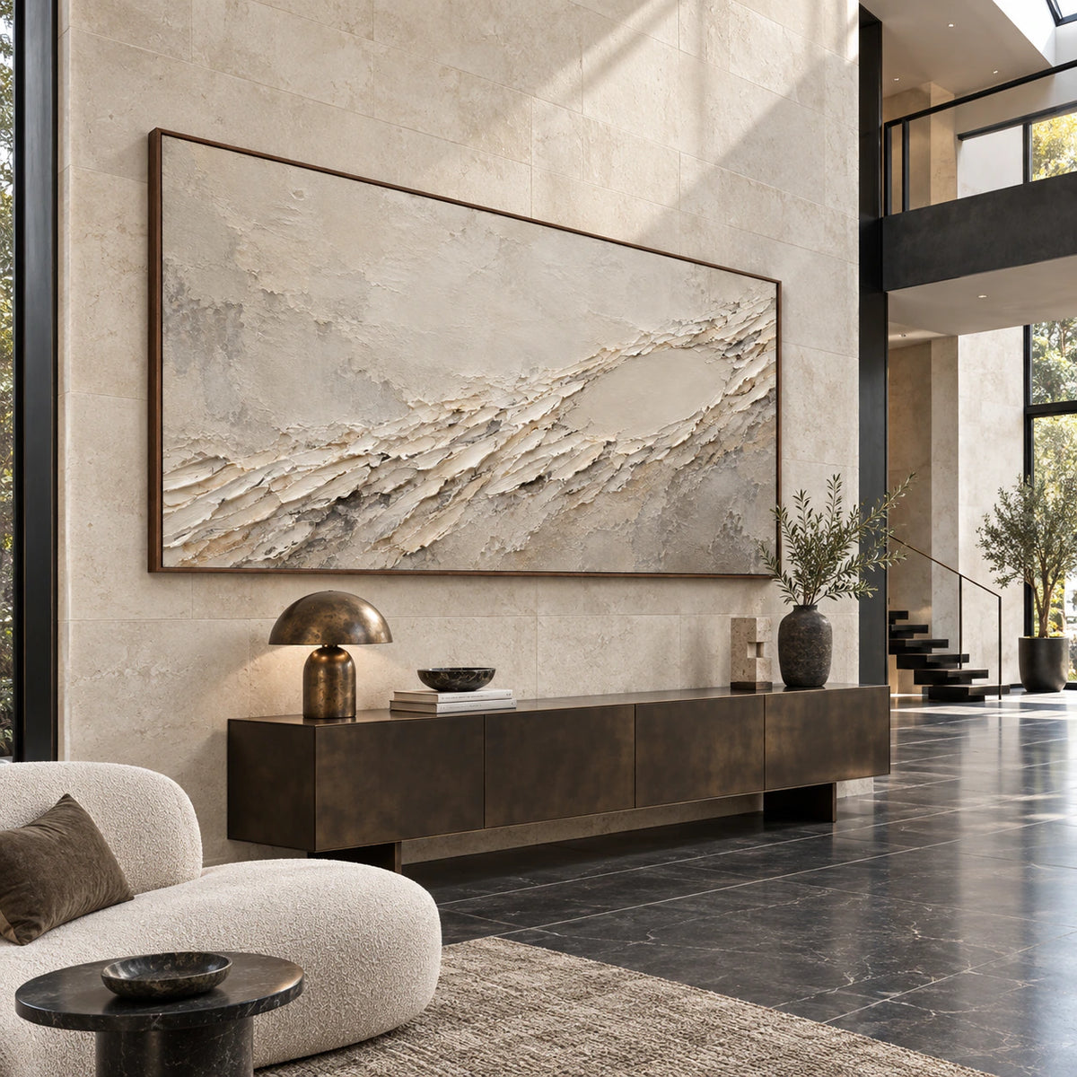 Large textured ivory and gray abstract artwork in a gallery-scale foyer.