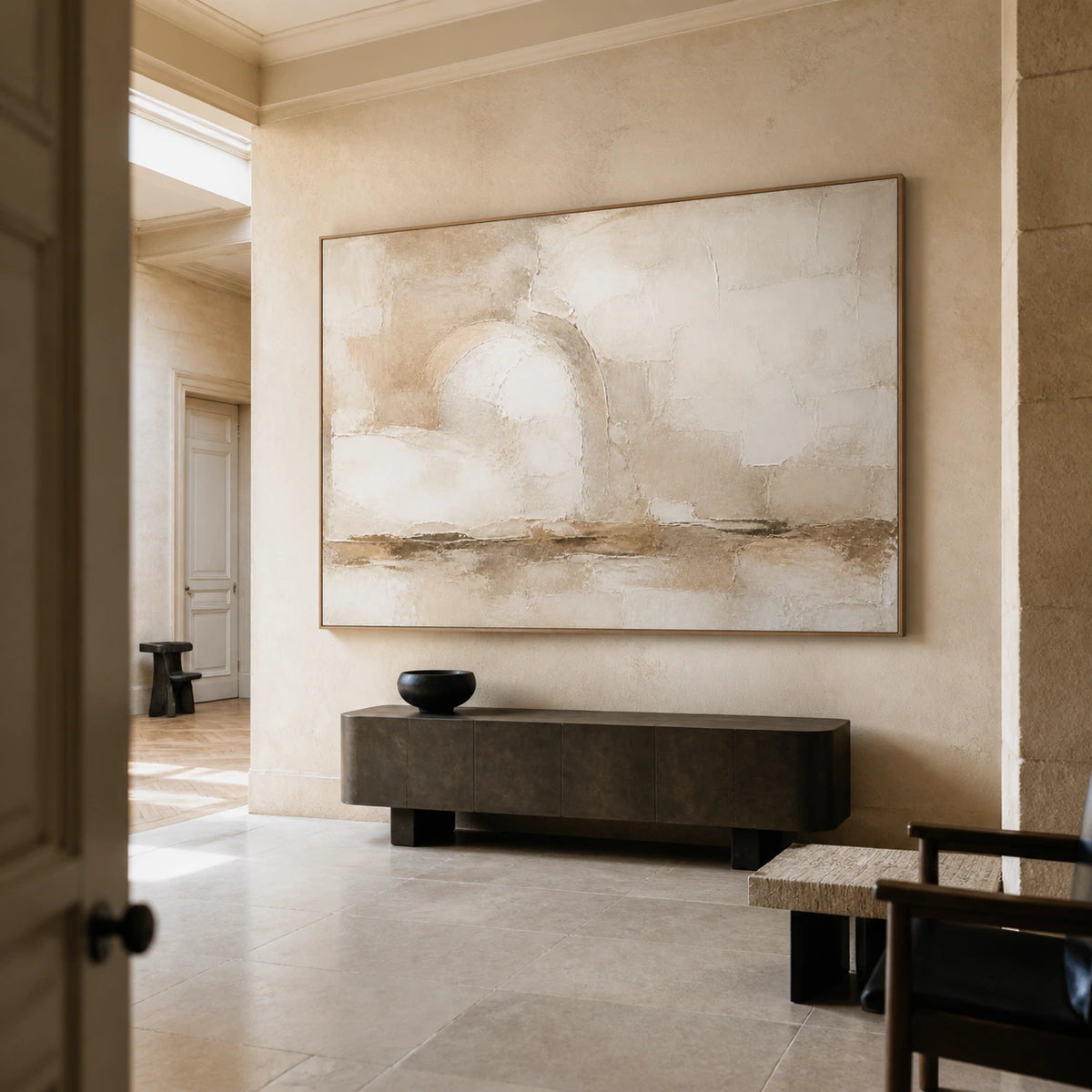 Earthen-Arc displayed large in a gallery-scale stone foyer.