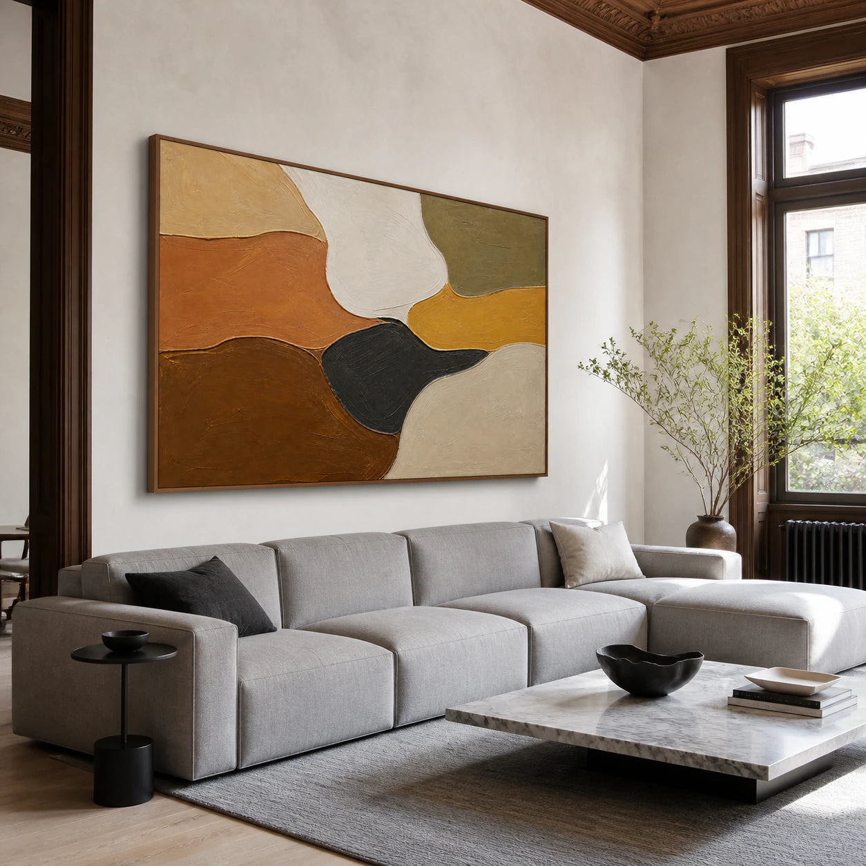 Earthen-Confluence above a sofa in a bright contemporary living room.