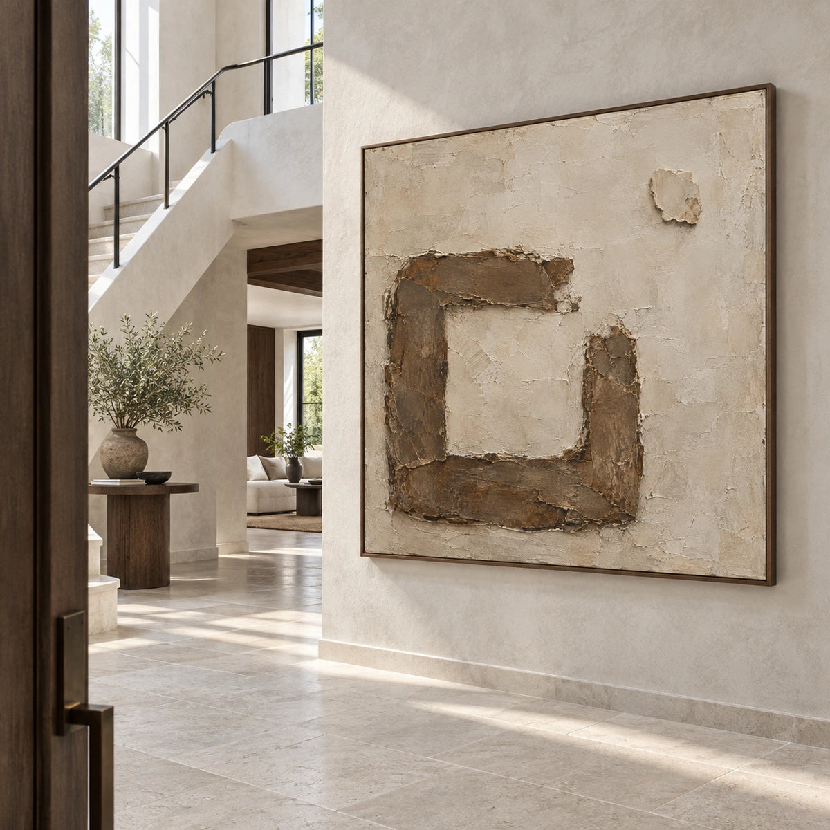 Earthen-Frame at gallery scale in a bright architectural foyer.