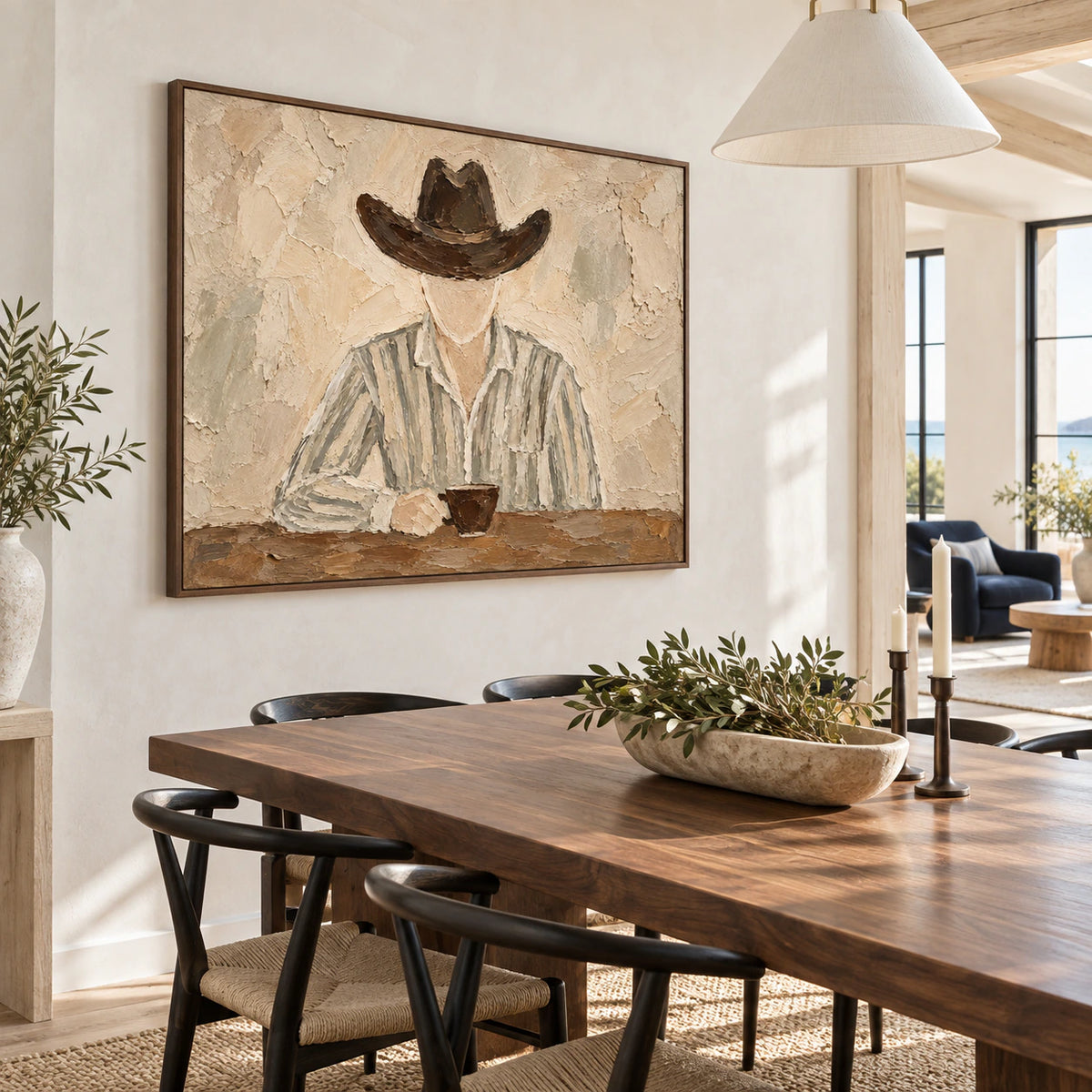 Horizontal muted figure painting as the focal point of a refined daylight dining room.