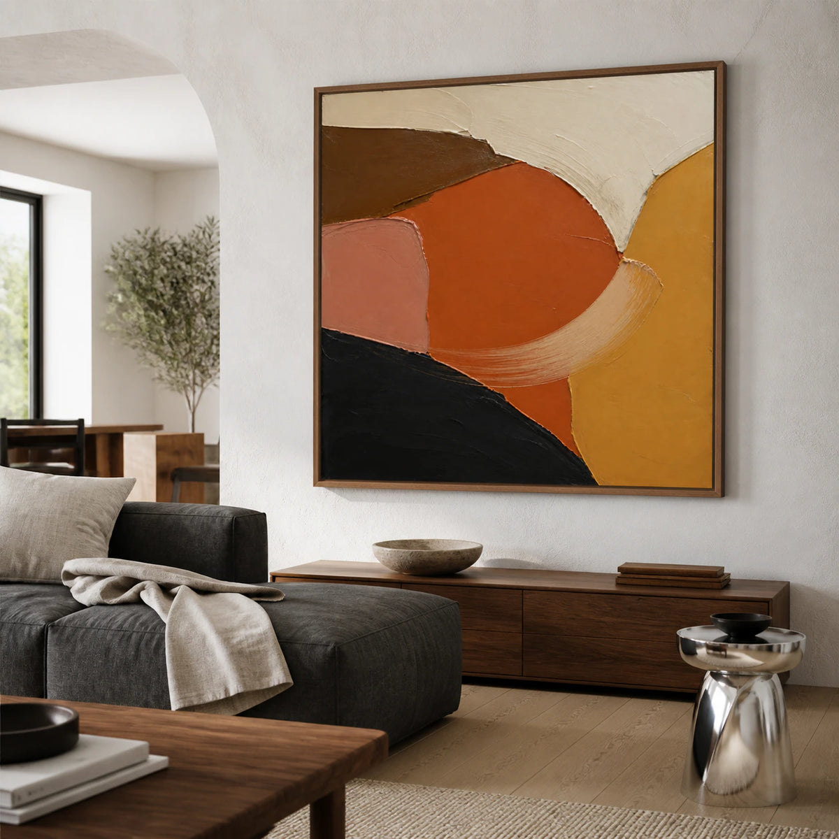 Ember-Contour as the focal artwork above a bright living room seating arrangement.