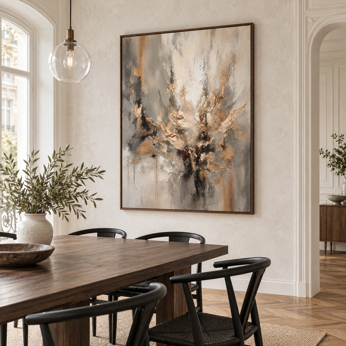 Ivory and charcoal textured abstract painting as the focal point of a refined daylight dining room.
