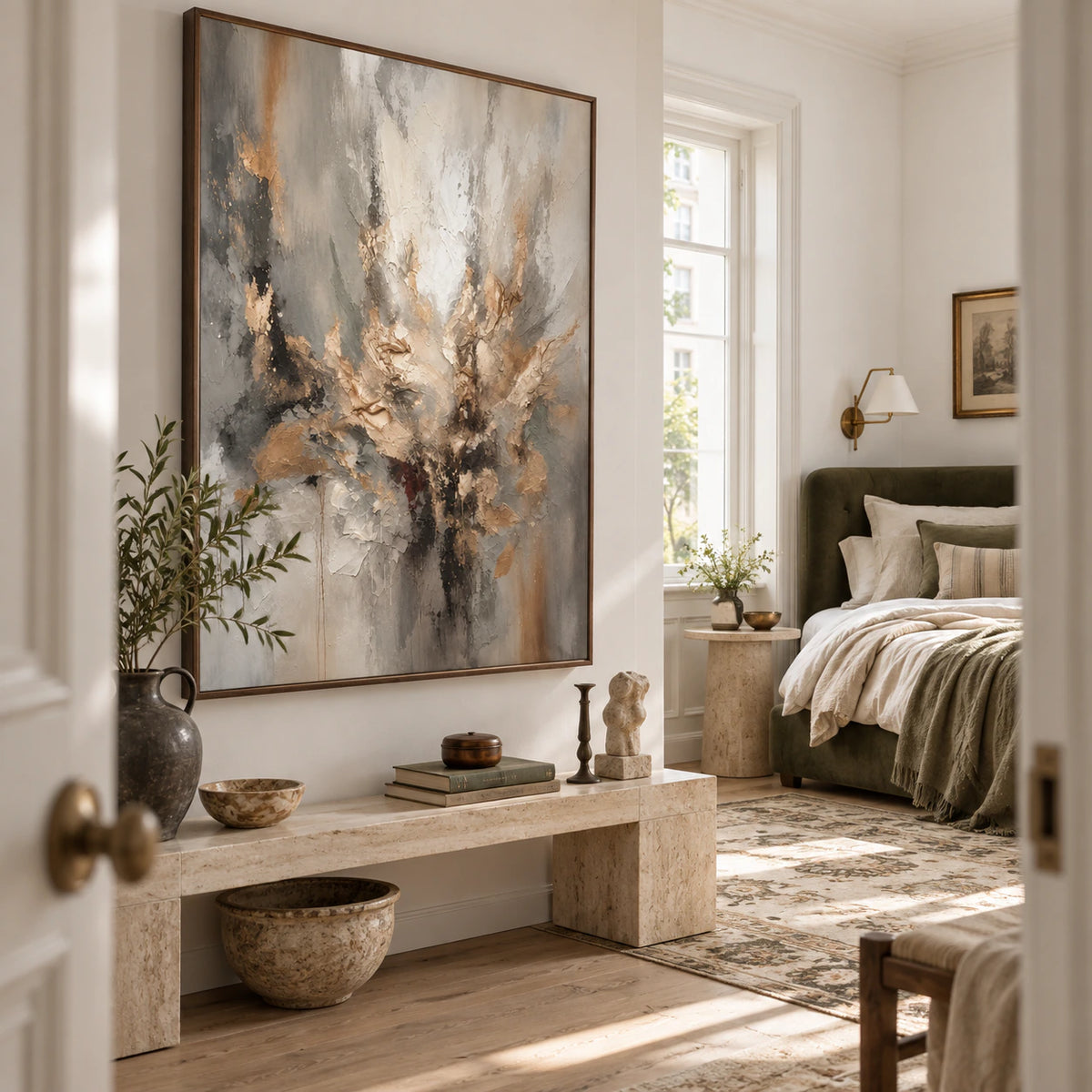 Vertical textured abstract artwork in a quiet, light-filled bedroom with understated furnishings.