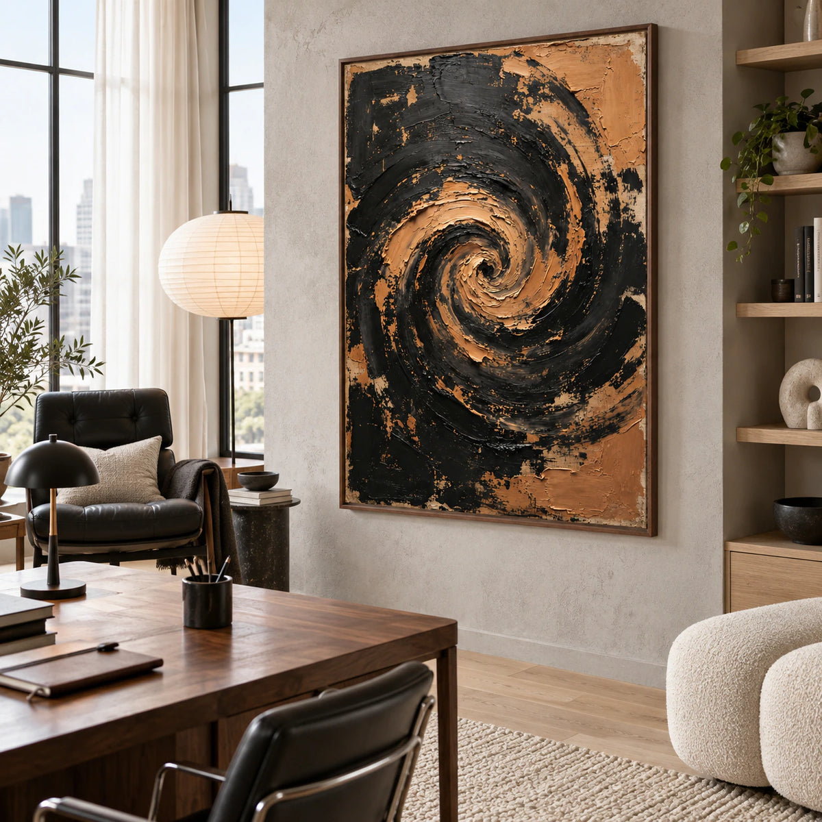 Large vertical black and ochre spiral painting in an airy reading and home office space.