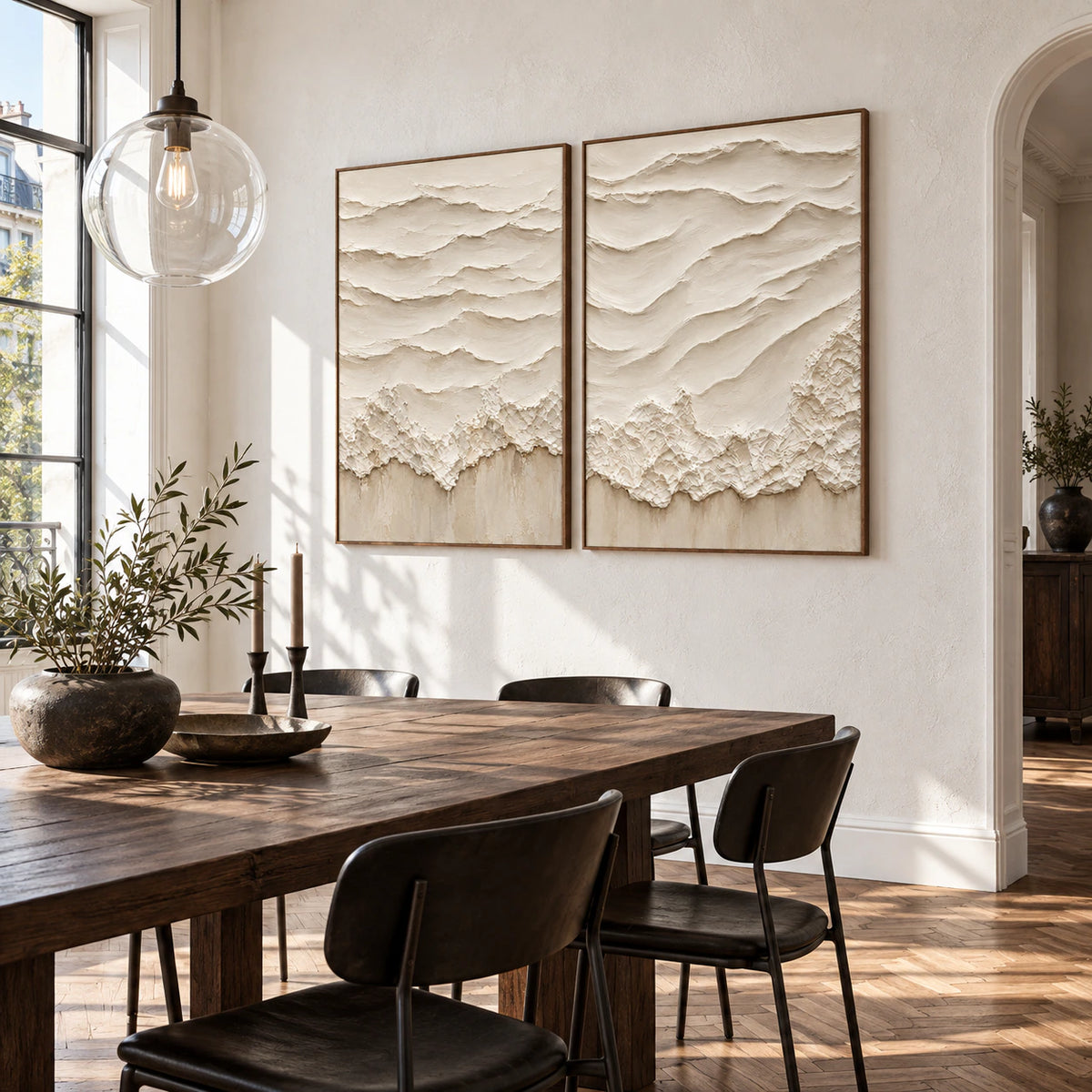 Eroded-Contours paired vertical relief paintings in a refined daylight dining room.
