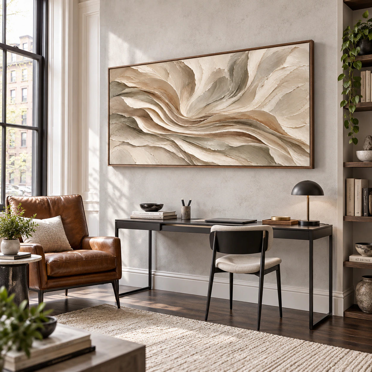 Large layered abstract painting in an airy home office reading space.