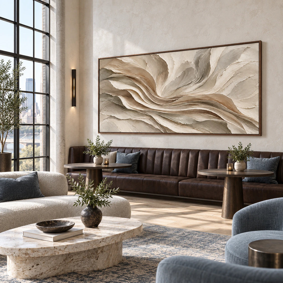 Large ivory and taupe textured abstract painting in an expansive loft hospitality interior.