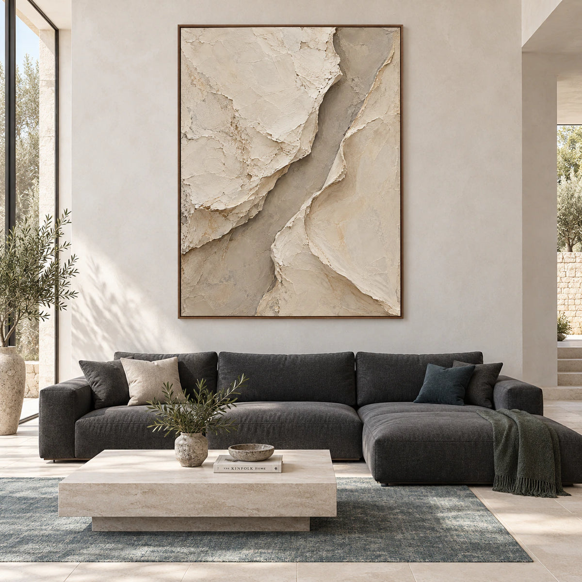 Large vertical ivory and taupe textured abstract painting displayed straight-on in a spacious daylight interior.