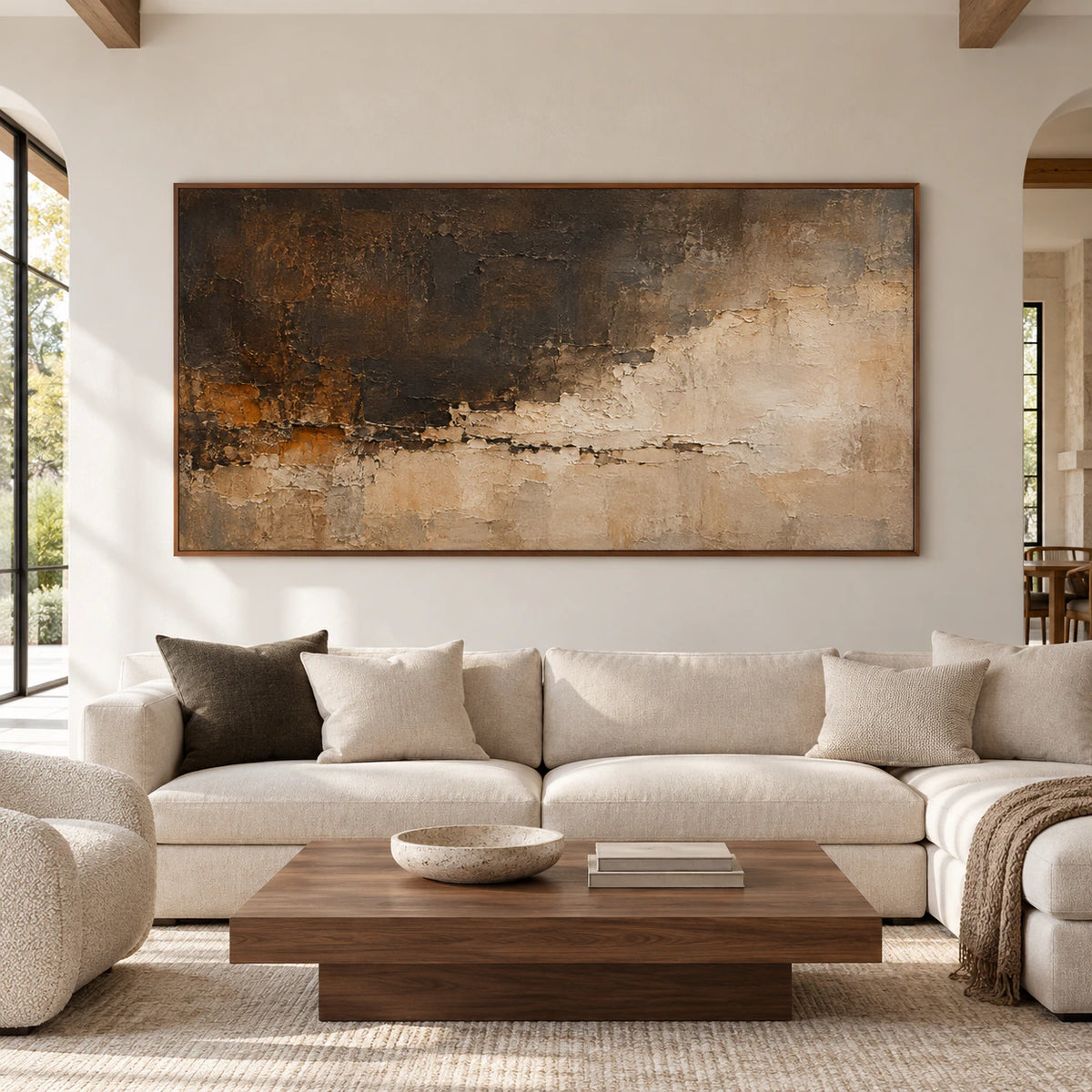 Fallow-Mantle framed horizontally in a bright, spacious living room, viewed straight on with restrained charcoal, pale stone and wood furnishings.