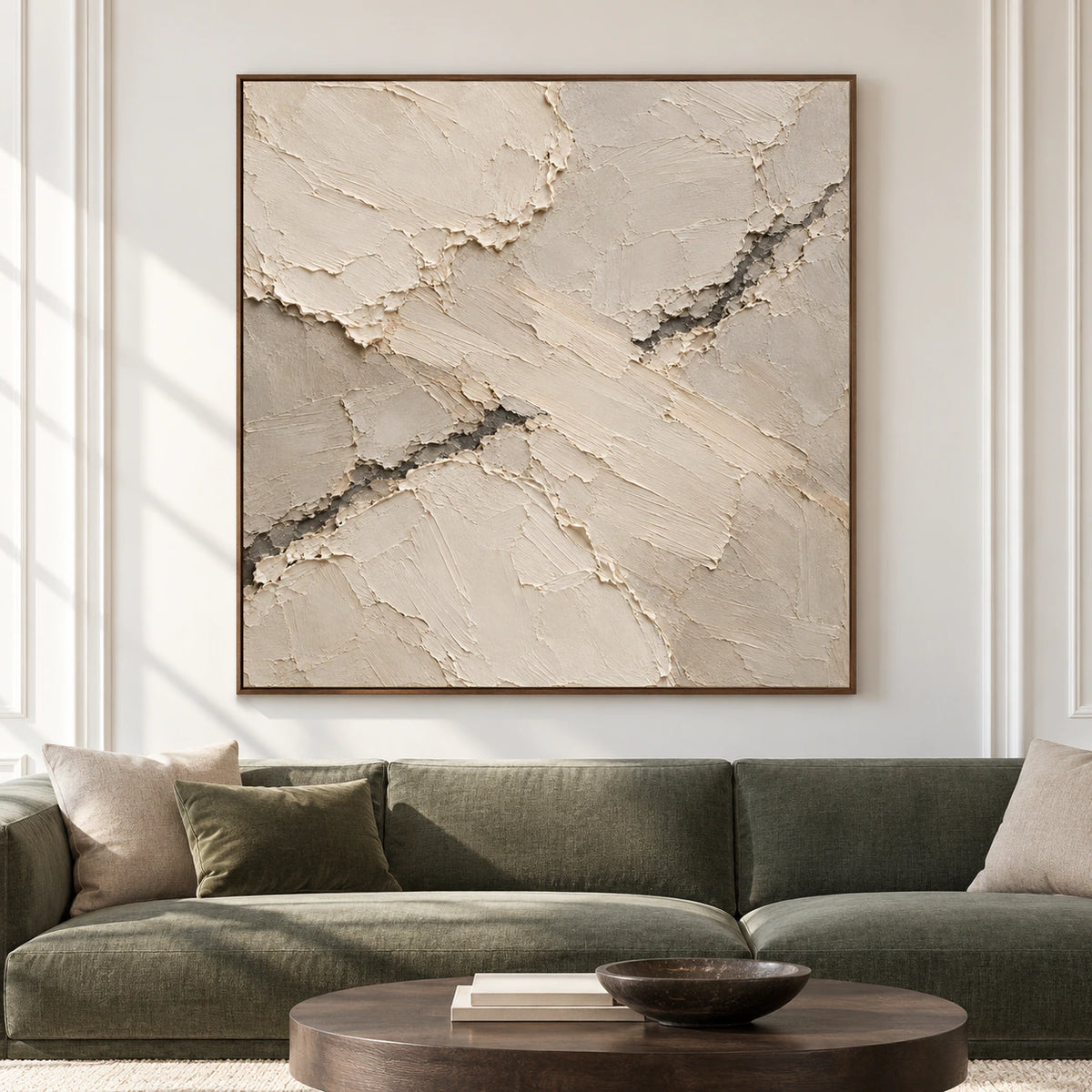 Large square abstract artwork displayed straight-on in an airy architectural living room, ivory and taupe ridges with charcoal fissures clearly visible.