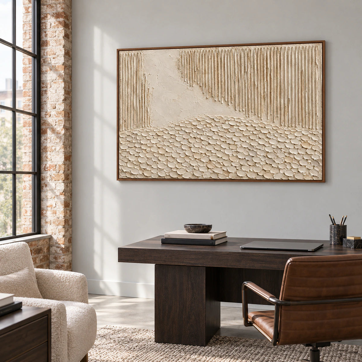 Large ivory and sand abstract artwork in an airy home office and reading space.