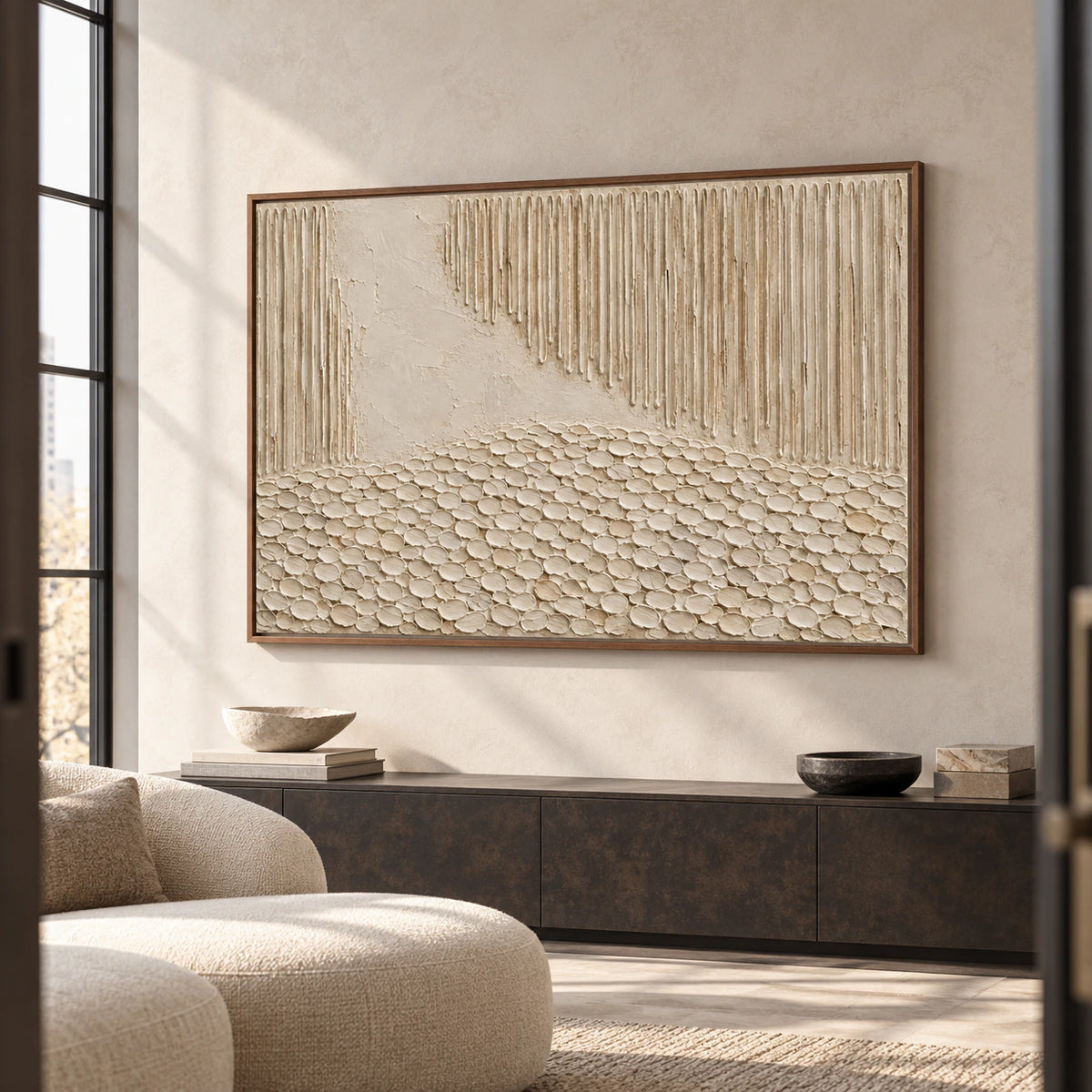 Oversized tactile abstract artwork in a bright, gallery-scale foyer.