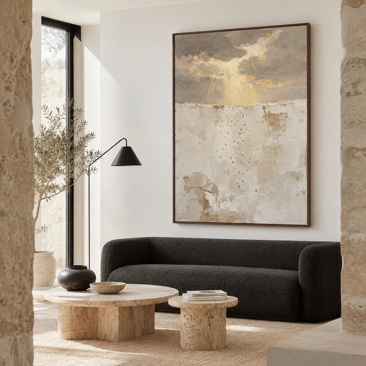 Gilded-Drift above a sculptural sofa in a bright living room.