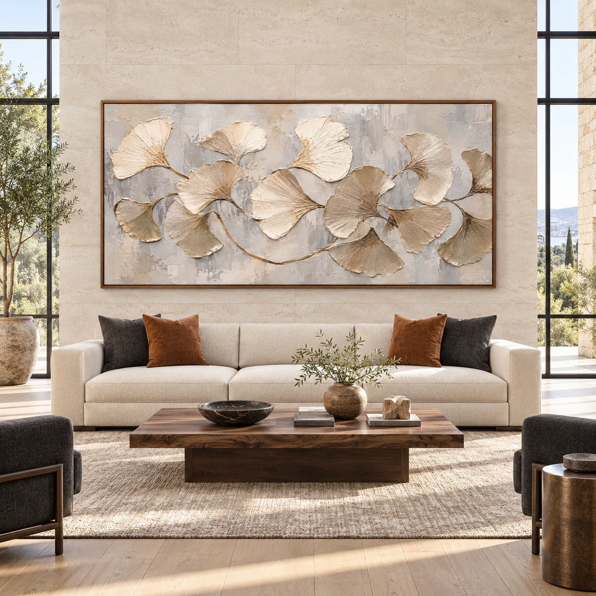 Large horizontal ginkgo relief artwork displayed straight-on in a spacious sunlit interior.
