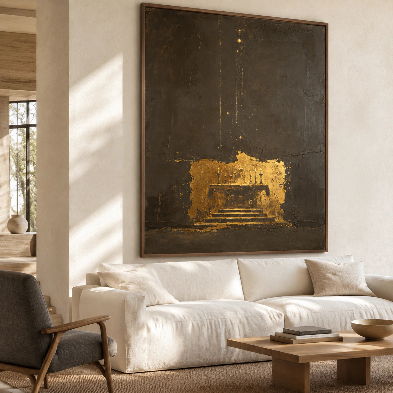 Dark and gold textured abstract painting above a bright contemporary living room sofa.