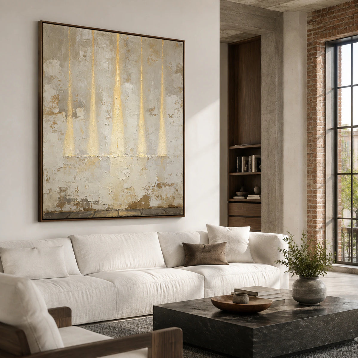 Gilded-Weather above a restrained sofa in a bright contemporary living room.