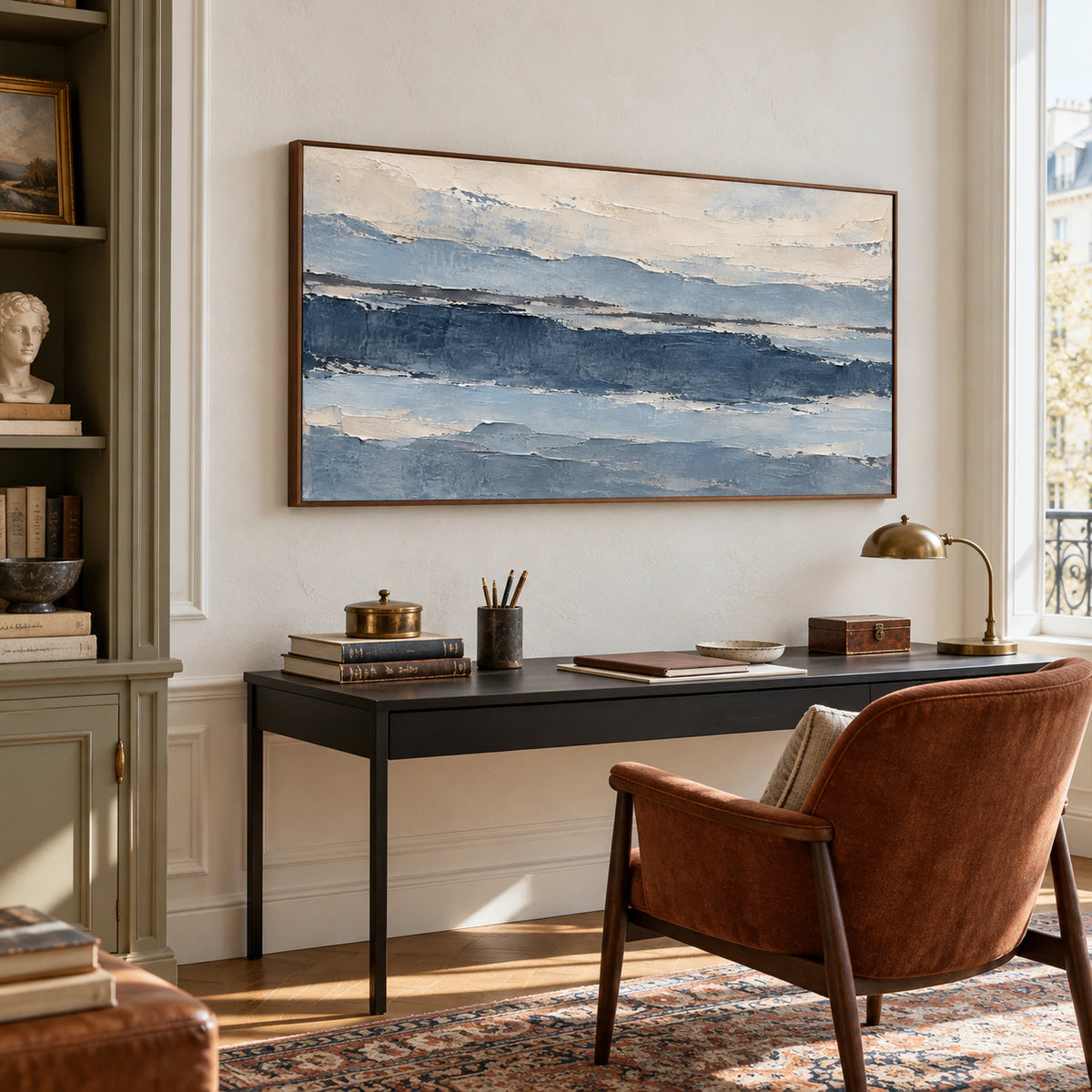 Glacier Ledger anchoring an airy home office with a writing desk and reading chair.