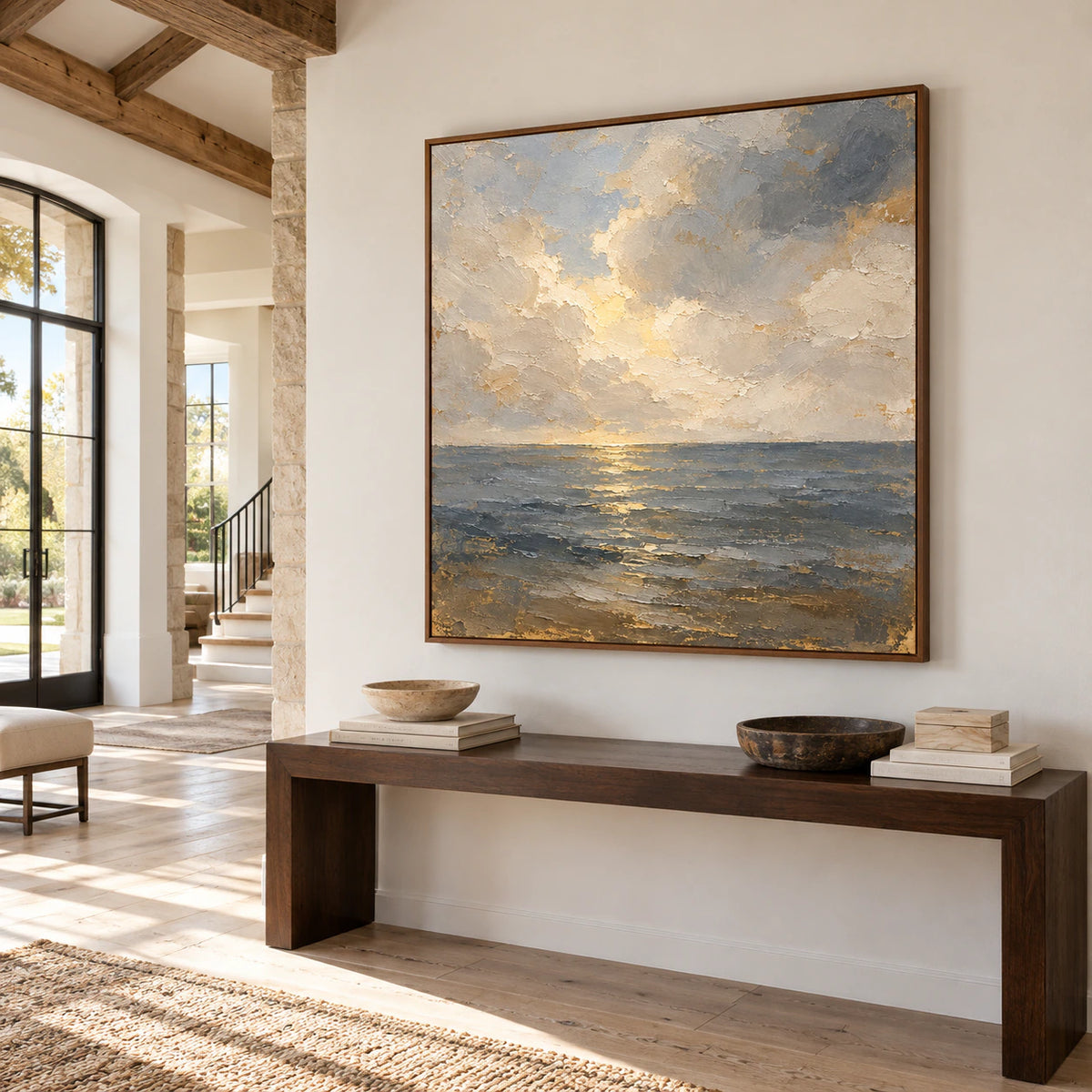 Right-oblique view of Gloaming-Tide above a dark console in a bright, spacious foyer with pale stone flooring and a high ceiling.