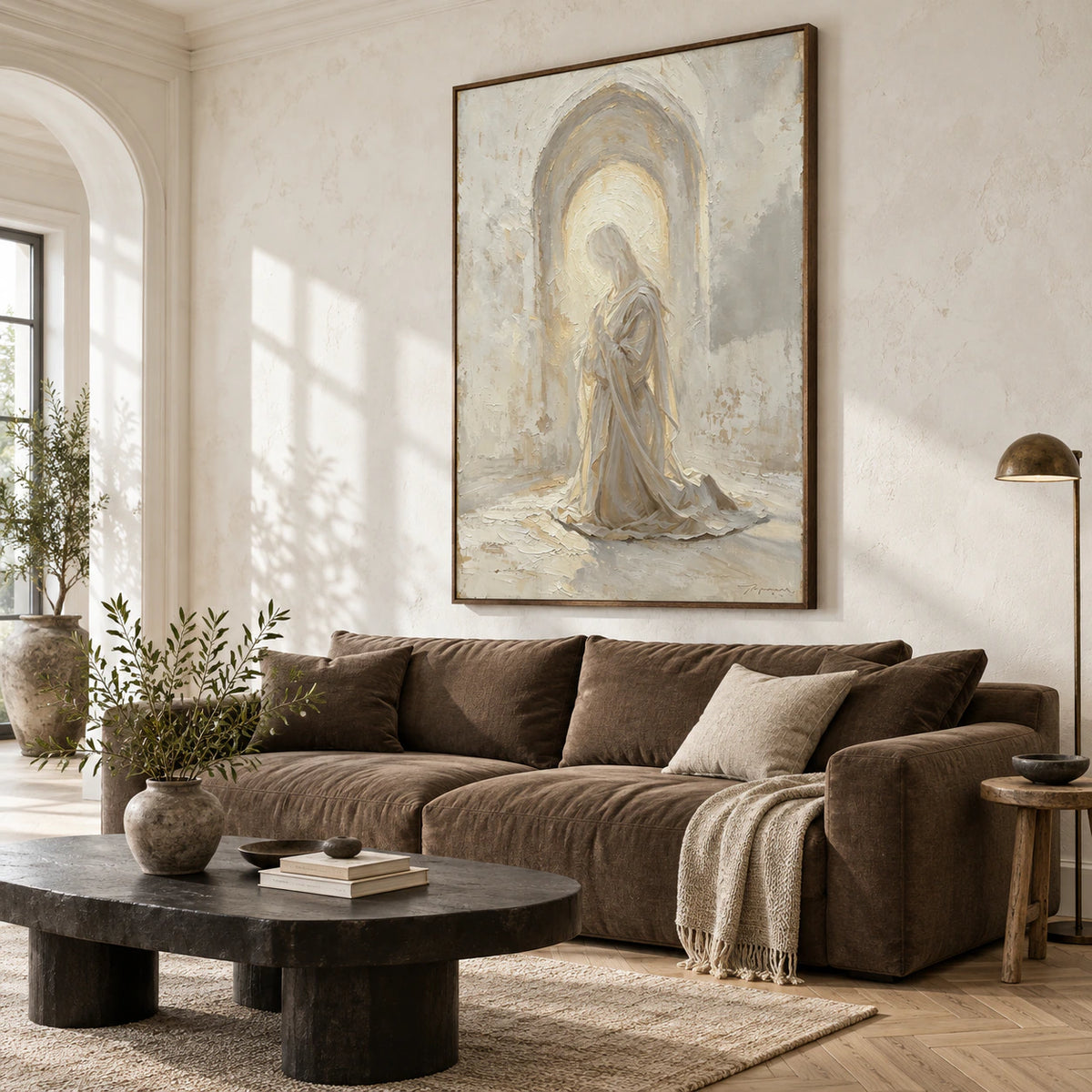 Hushed-Arch above a sculptural sofa in a bright living room.