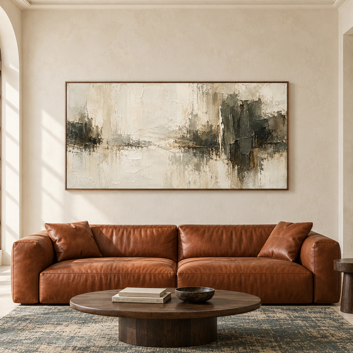 Ivory-Divide painting viewed straight-on in a spacious architectural living room with restrained furnishings and bright natural daylight.