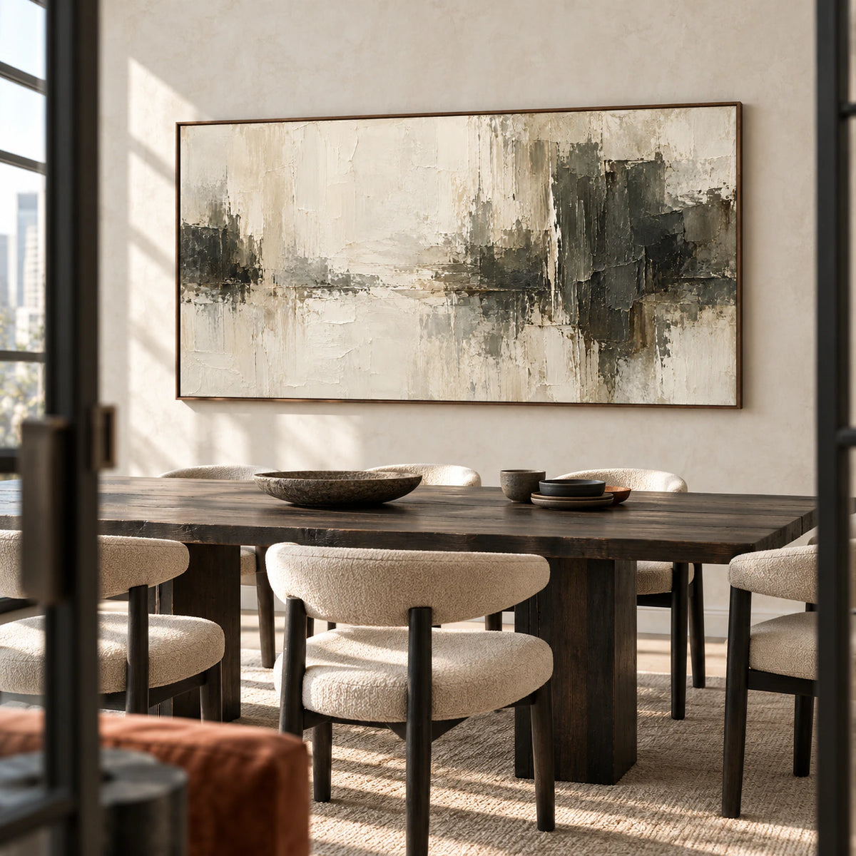 Ivory-Divide in a bright dining room with a long dark timber table and sculptural chairs, viewed from a slight right angle.