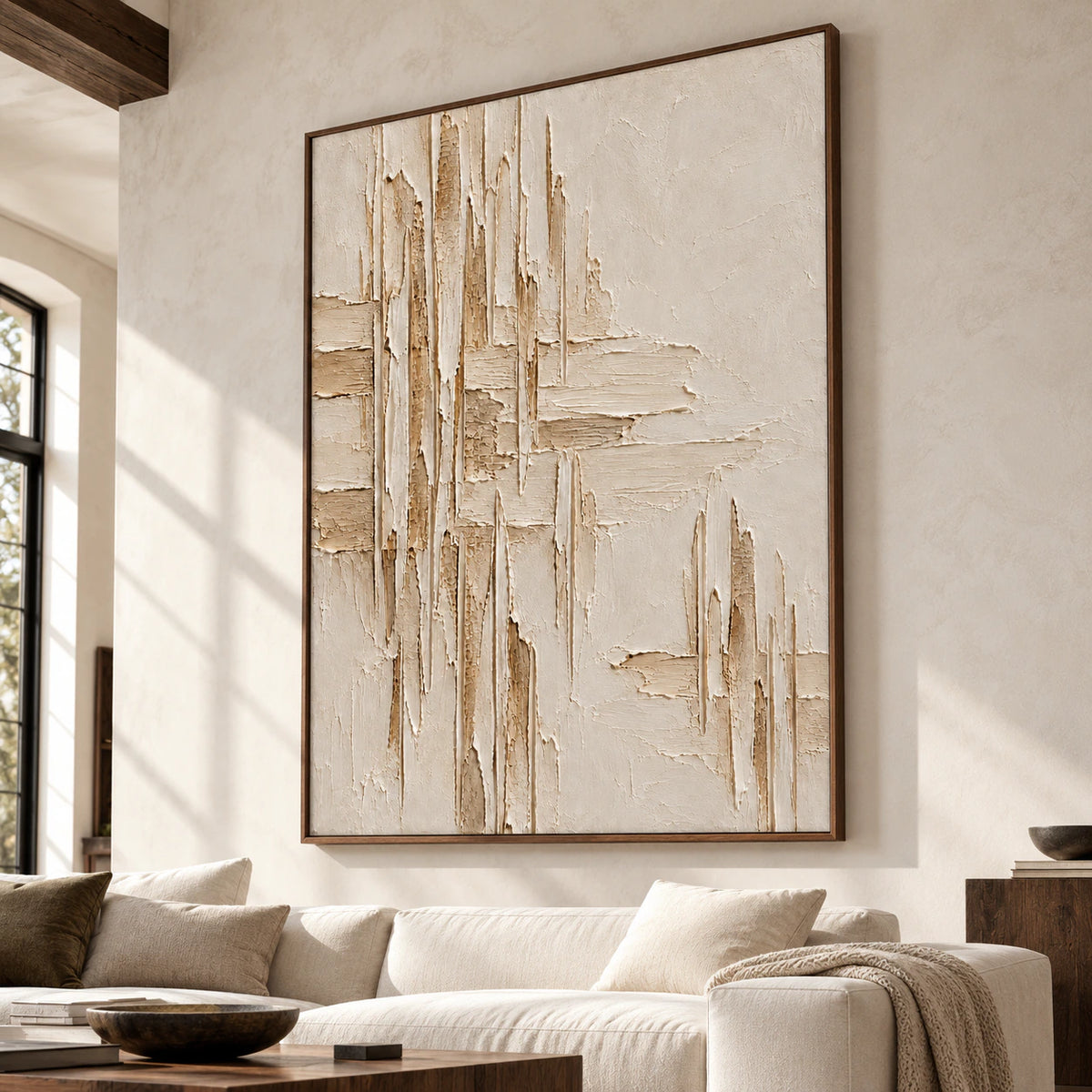 Large vertical ivory textured painting on a high wall in an expansive loft interior, viewed from a distant right angle with restrained furnishings and daylight.