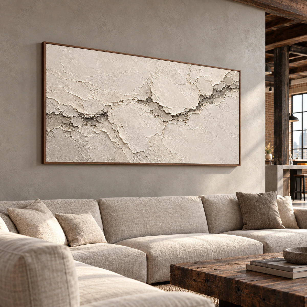 Ivory relief artwork displayed at large scale in an expansive hospitality interior with open loft architecture.