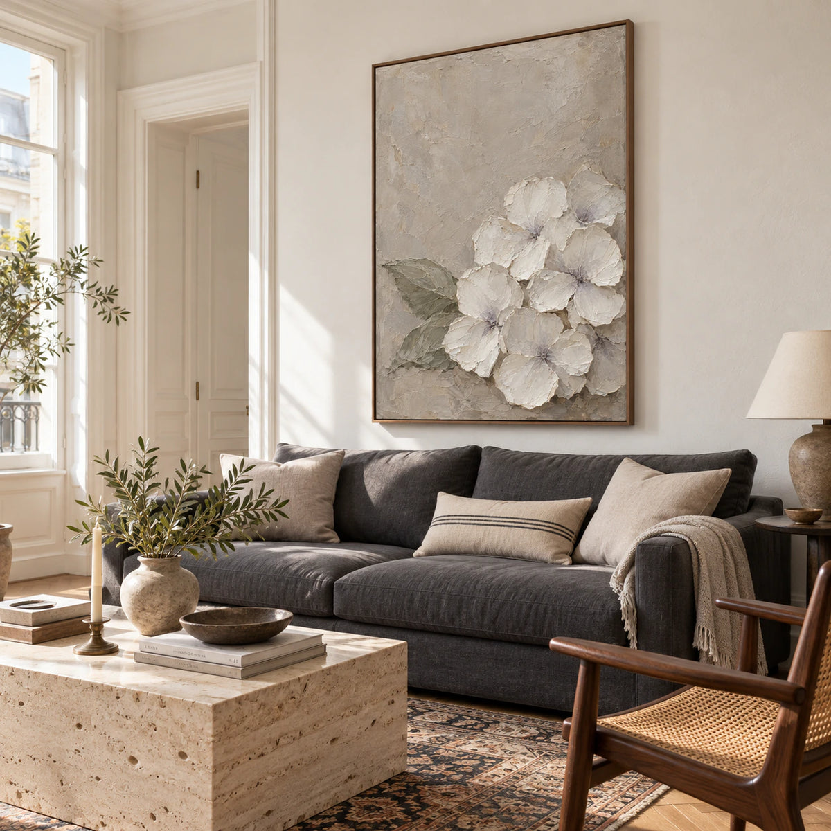 Bright living room centered on the Ivory-Quiet vertical floral painting.