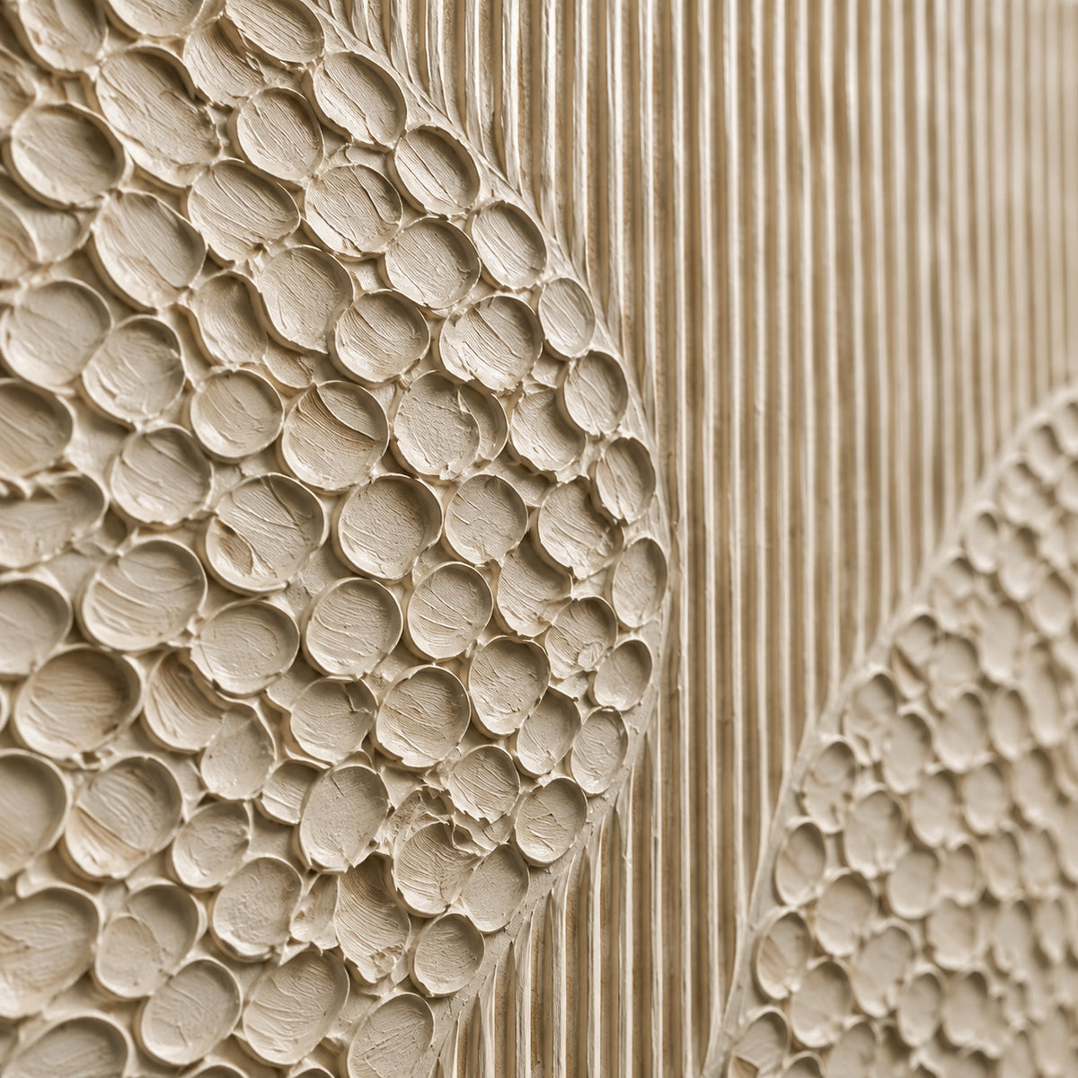Ivory-Relief oil painting brushwork and impasto detail photographed from an oblique side angle